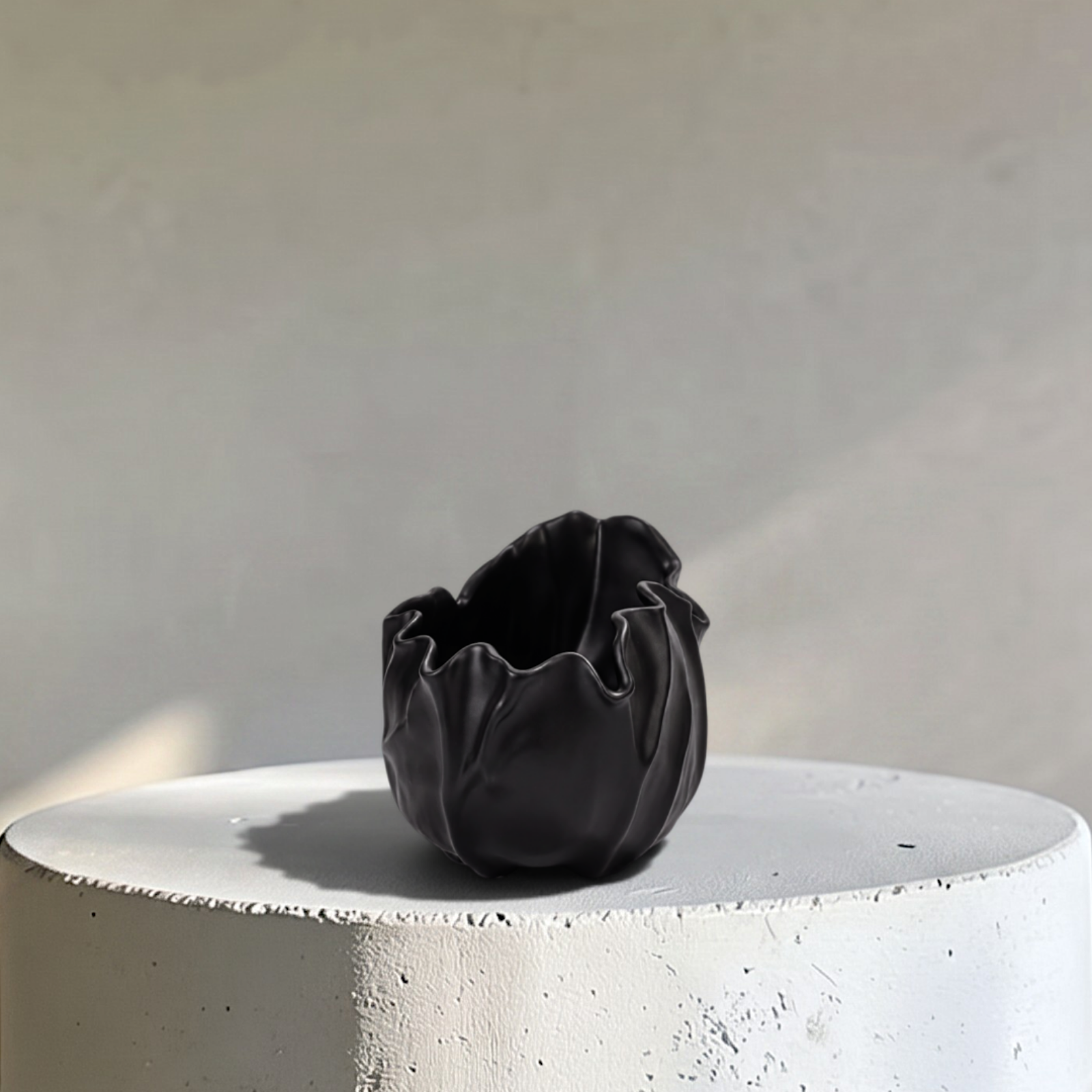 Theia, Black Ceramic Sculptural Vase, 7.3"L x 5.7"W x 6.1"H