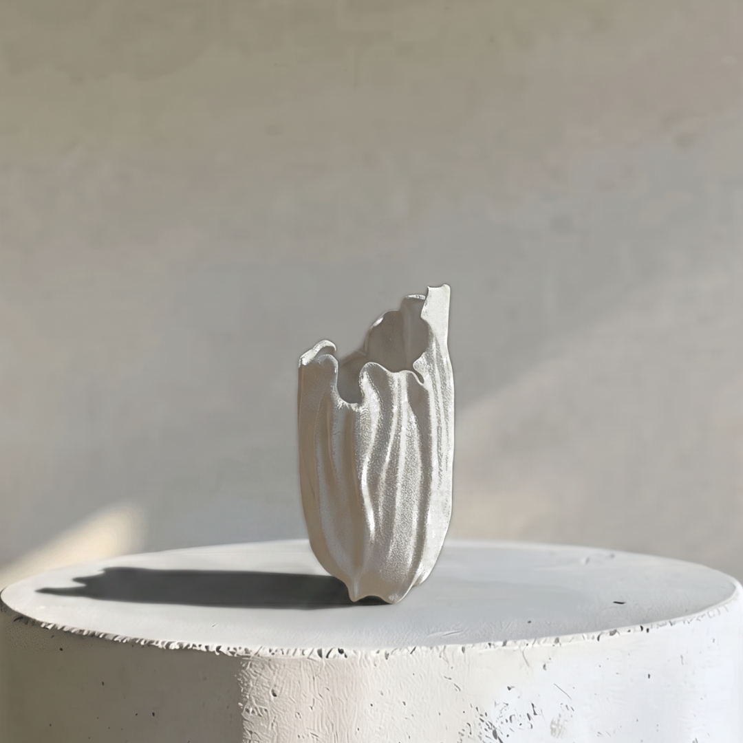 Lunaria Ivory Ceramic Sculptural Vase, 4.9"L x 4.5"W x 8.7"H.