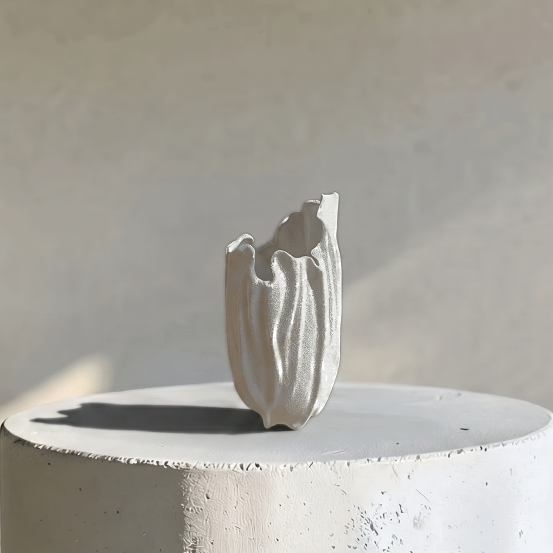 Lunaria Ivory Ceramic Sculptural Vase, 4.9"L x 4.5"W x 8.7"H.